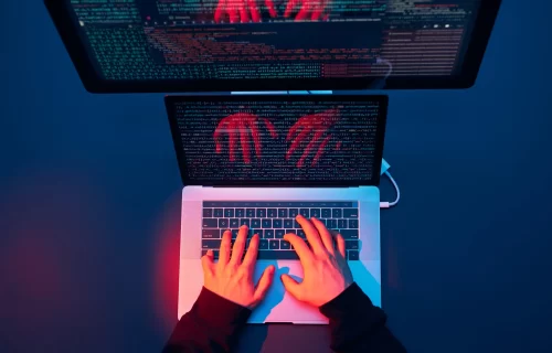 man-using-computer-and-programming-to-break-protec-2025-03-08-18-00-38-utc