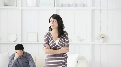 woman-standing-with-arms-crossed-looking-away-from-2026-01-09-08-28-23-utc